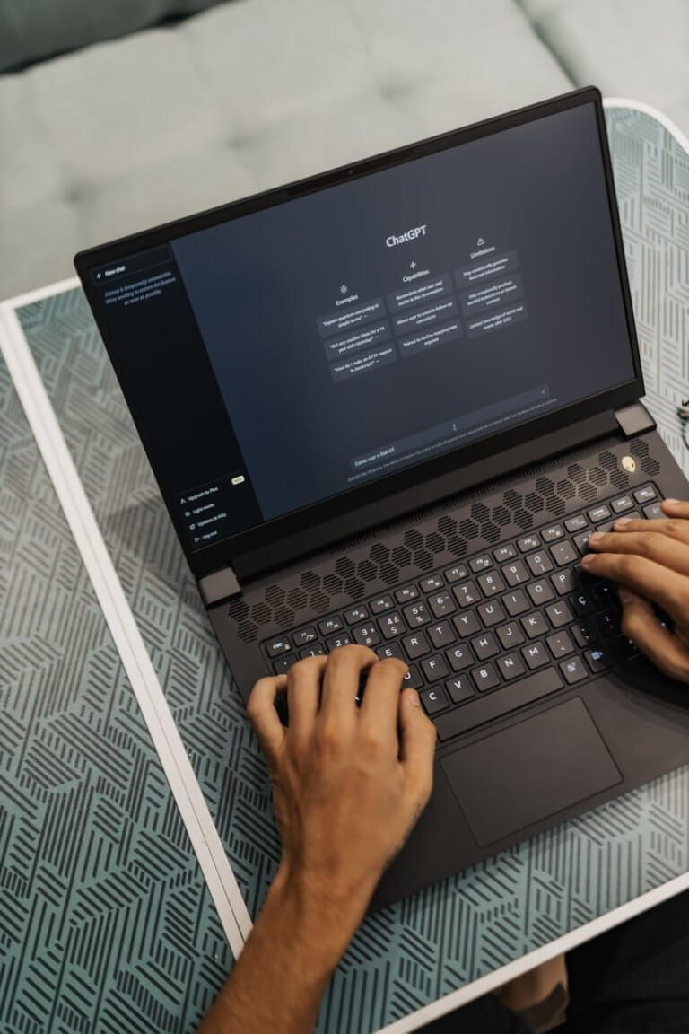 man using laptop wit chat gpt