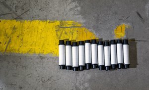 plastic thread rolls on a road